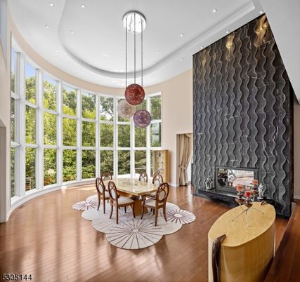 Dining room, Fireplace, Interior, Pendant Lights, Recessed Lighting, Wood Texture Flooring