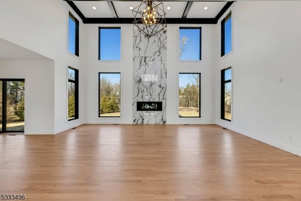 Empty room, Fireplace, Interior, Pendant Lights, Recessed Lighting, Wood Texture Flooring