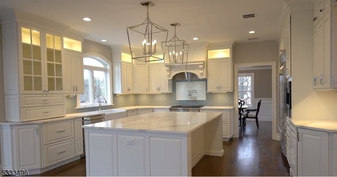 Chandelier, Interior, Kitchen, Pendant Lights, Recessed Lighting, Stainless Steel Appliances, Wood Texture Flooring