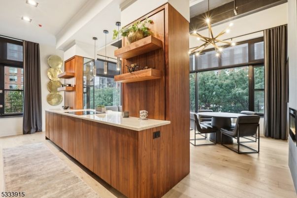 Dining room, Fireplace, Interior, Pendant Lights, Recessed Lighting, Wood Texture Flooring