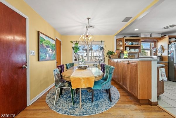 Chandelier, Dining room, Interior, Recessed Lighting, Wood Texture Flooring