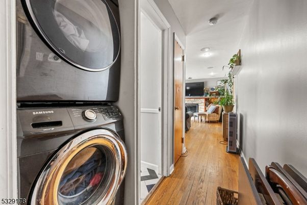 Fireplace, Interior, Recessed Lighting, Utility Closets, Washer, Wood Texture Flooring