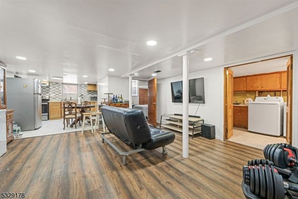 Dining room, Interior, Kitchen, Recessed Lighting, Stainless Steel Appliances, Wood Texture Flooring