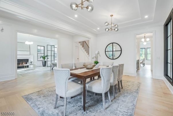 Dining room, Fireplace, Interior, Pendant Lights, Recessed Lighting, Wood Texture Flooring