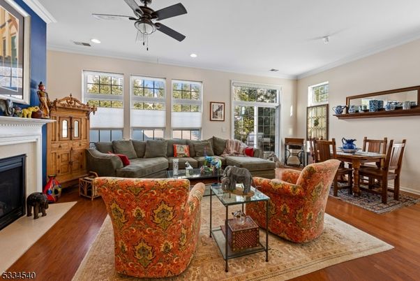 Dining room, Fireplace, Interior, Living room, Recessed Lighting, Wood Texture Flooring
