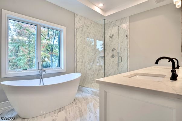 Bathroom, Dual Sink Vanities, Free Standing Baths, Glass Shower, Interior, Marble, Marble Walls, Recessed Lighting
