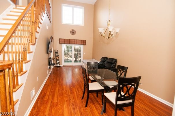Chandelier, Dining room, Interior, Wood Texture Flooring