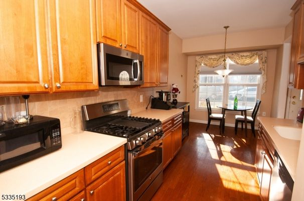 Dining room, Interior, Kitchen, Pendant Lights, Stainless Steel Appliances, Wood Texture Flooring