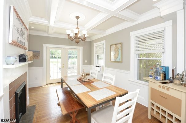 Chandelier, Dining room, Fireplace, Interior, Recessed Lighting, Wood Texture Flooring