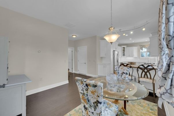 Dining room, Interior, Kitchen, Pendant Lights, Recessed Lighting, Stainless Steel Appliances, Wood Texture Flooring