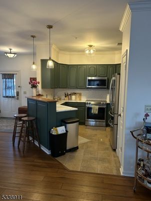 Interior, Kitchen, Pendant Lights, Stainless Steel Appliances, Wood Texture Flooring