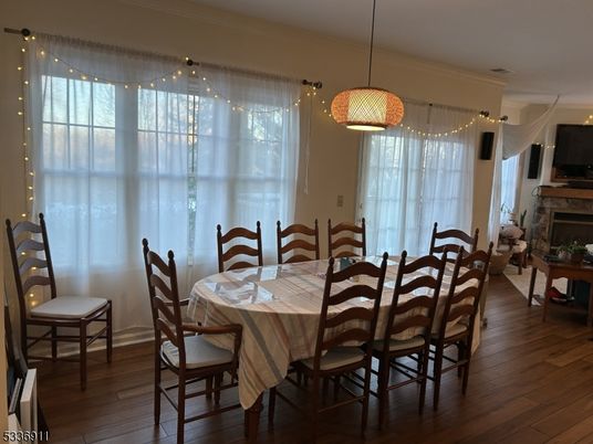 Dining room, Fireplace, Interior, Pendant Lights, Wood Texture Flooring