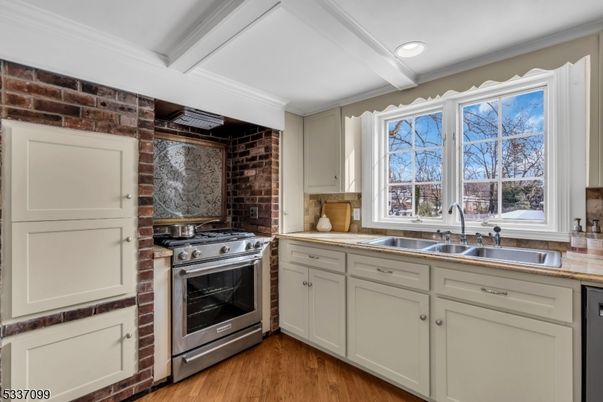 Interior, Kitchen, Recessed Lighting, Stainless Steel Appliances, Stone Walls, Wood Texture Flooring