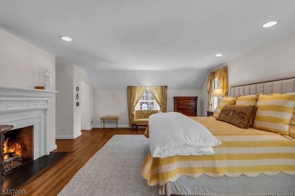 Bedroom, Fireplace, Interior, Recessed Lighting, Wood Texture Flooring