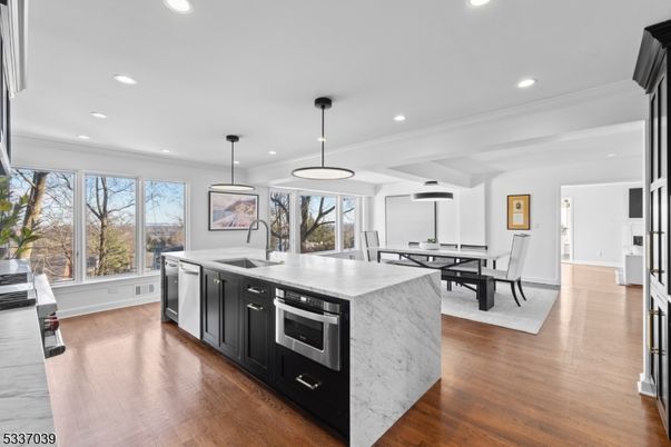 Dining room, Interior, Kitchen, Pendant Lights, Recessed Lighting, Stainless Steel Appliances, Wood Texture Flooring