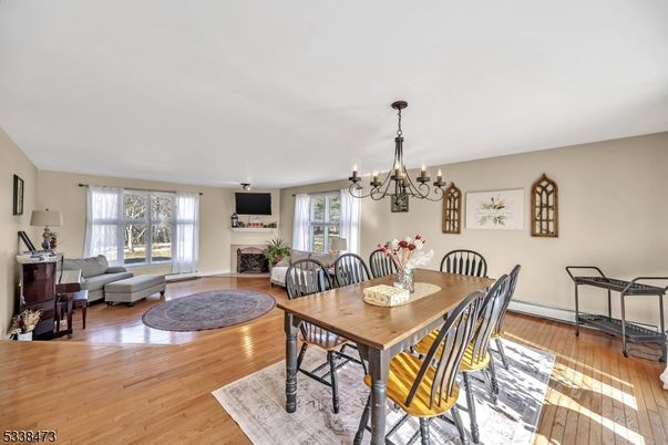 Chandelier, Dining room, Fireplace, Interior, Living room, Wood Texture Flooring