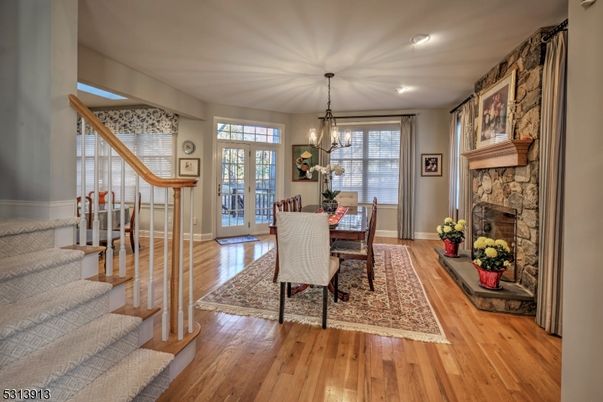 Chandelier, Dining room, Fireplace, Interior, Recessed Lighting, Wood Texture Flooring