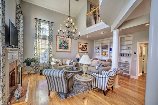 Chandelier, Fireplace, Interior, Living room, Recessed Lighting, Wood Texture Flooring