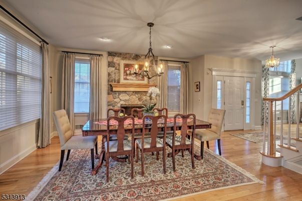 Chandelier, Dining room, Fireplace, Interior, Recessed Lighting, Wood Texture Flooring