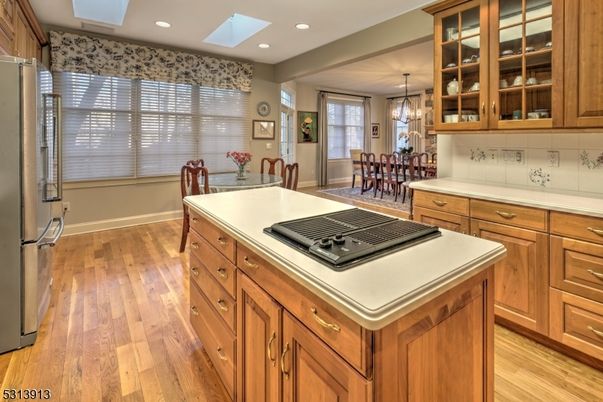Chandelier, Dining room, Interior, Kitchen, Recessed Lighting, Stainless Steel Appliances, Wood Texture Flooring