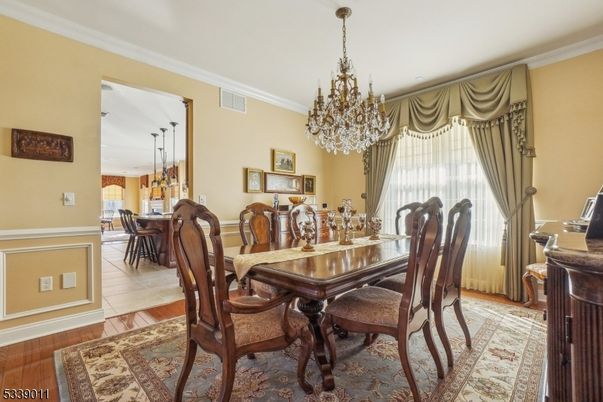 Chandelier, Dining room, Interior, Pendant Lights, Wood Texture Flooring