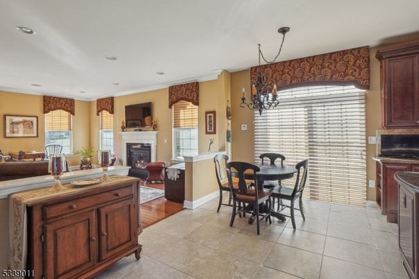 Chandelier, Dining room, Fireplace, Interior, Living room, Recessed Lighting, Wood Texture Flooring