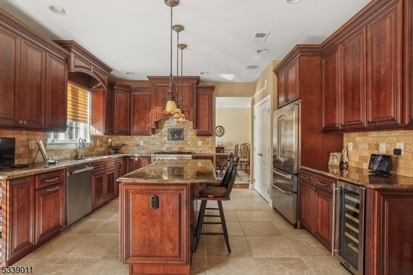 Interior, Kitchen, Pendant Lights, Recessed Lighting, Stainless Steel Appliances, Stone Walls