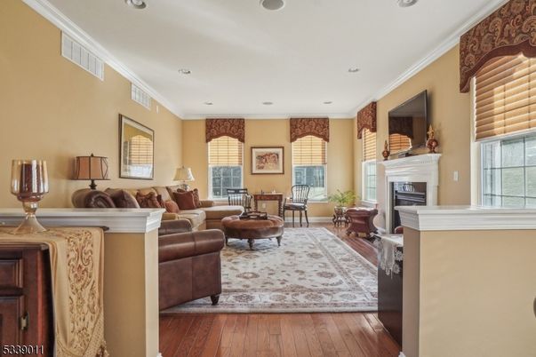 Fireplace, Interior, Living room, Recessed Lighting, Wood Texture Flooring