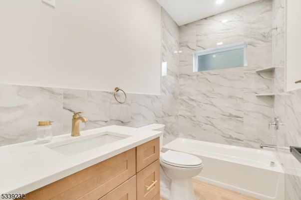 Bathroom, Interior, Marble Walls, Recessed Lighting, Wood Texture Flooring