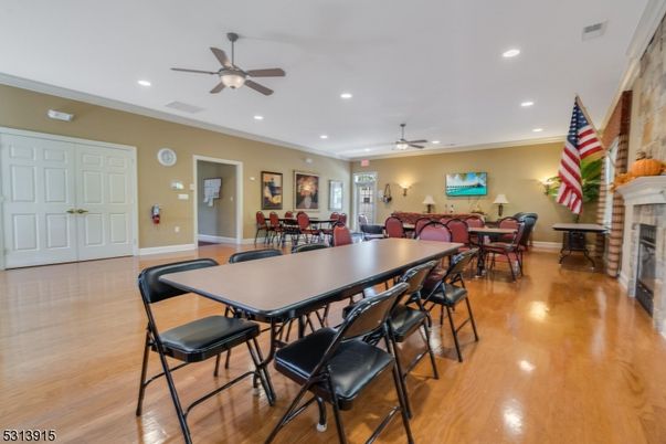 Dining room, Fireplace, Interior, Recessed Lighting, Wood Texture Flooring