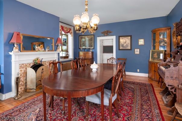 Chandelier, Dining room, Fireplace, Interior, Wood Texture Flooring