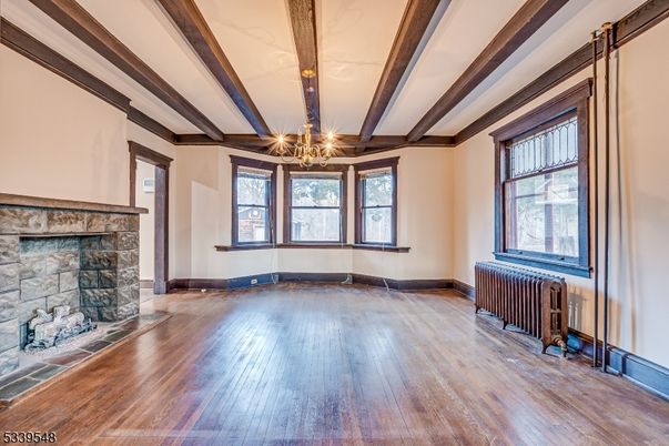 Chandelier, Empty room, Fireplace, Interior, Wooden Beams, Wood Texture Flooring