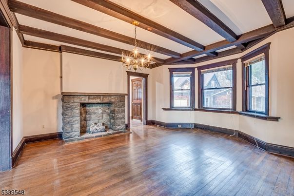 Chandelier, Empty room, Fireplace, Interior, Wooden Beams, Wood Texture Flooring