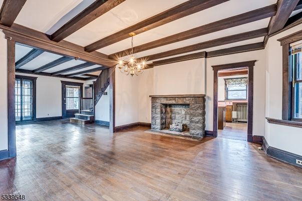 Chandelier, Empty room, Fireplace, Interior, Wooden Beams, Wood Texture Flooring