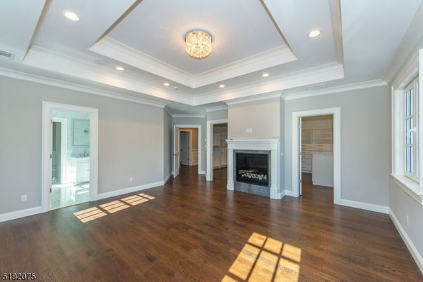 Chandelier, Empty room, Fireplace, Interior, Recessed Lighting, Wood Texture Flooring