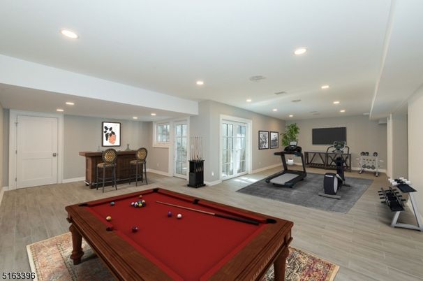 Billiard Table, Fitness Equipment, Game Room, Interior, Recessed Lighting, Wood Texture Flooring