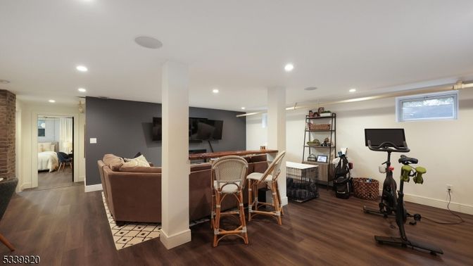 Bedroom, Fitness Equipment, Interior, Living room, Recessed Lighting, Wood Texture Flooring