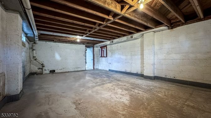 Garage, Interior, Stone Walls, Wooden Beams