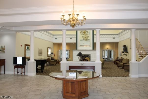 Chandelier, Fireplace, Interior, Living room, Piano, Recessed Lighting