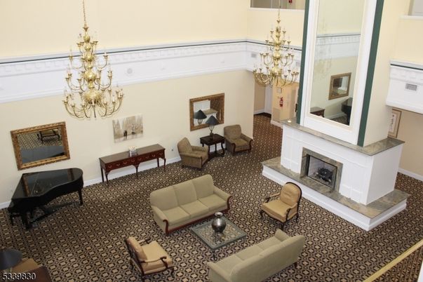 Chandelier, Fireplace, Interior, Living room