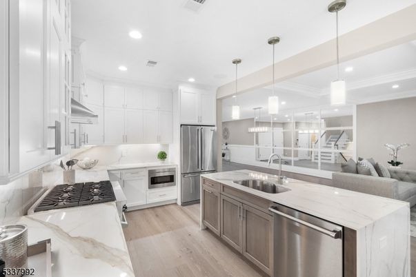 Interior, Kitchen, Pendant Lights, Recessed Lighting, Stainless Steel Appliances, Wood Texture Flooring