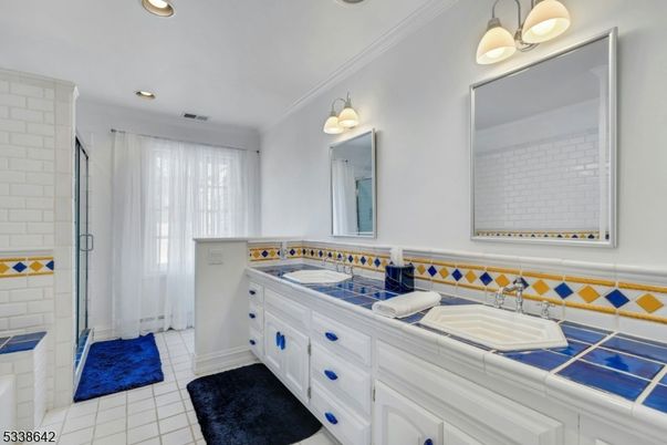 Bathroom, Dual Sink Vanities, Interior, Recessed Lighting, Tile Countertops