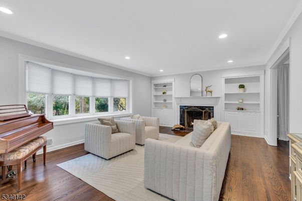 Fireplace, Interior, Living room, Piano, Recessed Lighting, Wood Texture Flooring