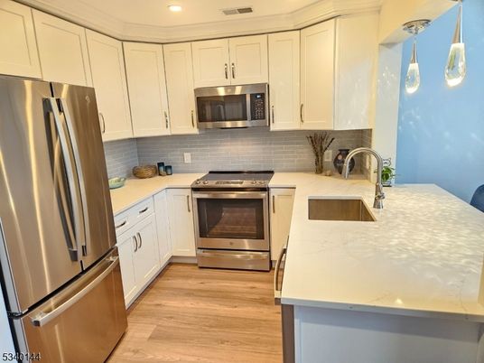 Interior, Kitchen, Pendant Lights, Recessed Lighting, Stainless Steel Appliances, Wood Texture Flooring