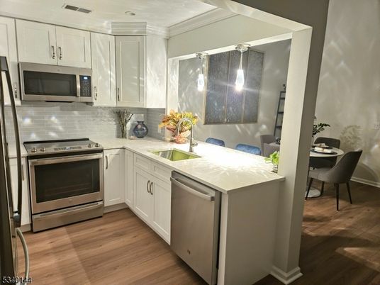Interior, Kitchen, Pendant Lights, Stainless Steel Appliances, Wood Texture Flooring