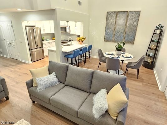 Dining room, Interior, Kitchen, Living room, Recessed Lighting, Stainless Steel Appliances, Wood Texture Flooring