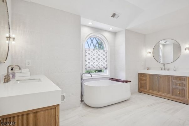 Bathroom, Dual Sink Vanities, Free Standing Baths, Interior, Marble, Recessed Lighting
