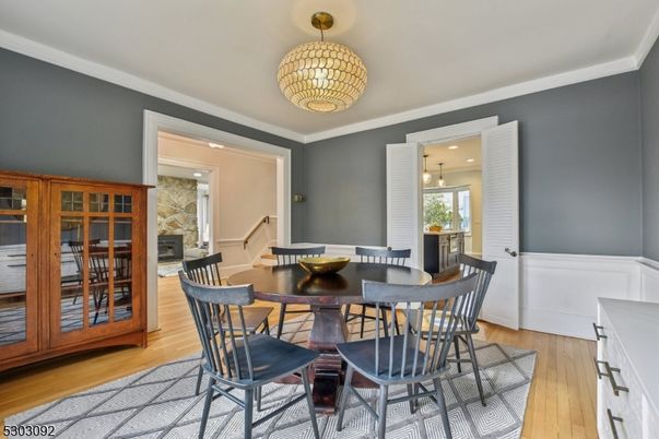 Dining room, Fireplace, Interior, Pendant Lights, Recessed Lighting, Wood Texture Flooring