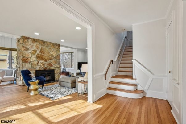 Fireplace, Interior, Recessed Lighting, Stone Walls, Wood Texture Flooring