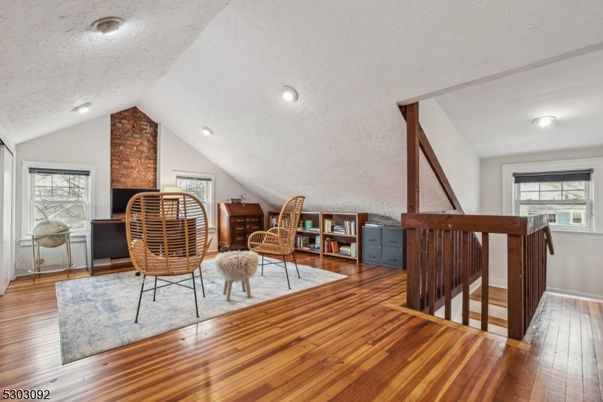 Fireplace, Home Office, Interior, Recessed Lighting, Stone Walls, Wood Texture Flooring